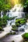 Mun Dang Waterfall In Deep Forest Fresh Green Rain Season In Tha Stock Photo