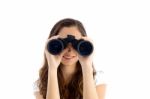 Smiling Female Watching Through Binocular Stock Photo