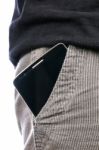 Smartphone With A Black Screen In The Pocket Of Jeans Stock Photo