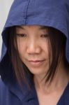 Asian Woman Wearing Hood Stock Photo