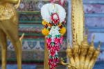 Garland To Worship Buddha Statue Stock Photo