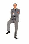 Businessman With Arms Crossed Stock Photo