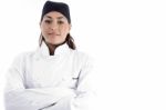 Female Chef With Arm Crossed Stock Photo