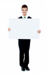 School Boy Showing Blank Board Stock Photo