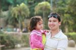 Father And Daughter In Park Stock Photo