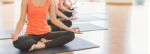 Asian Woman Doing Yoga Indoors Stock Photo