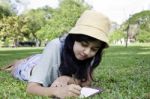 Beautiful Teenage Girl Writting Book Stock Photo