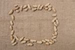 Peanuts On A Burlap Background Stock Photo