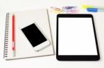 Tablet And Phone On Work Table Stock Photo