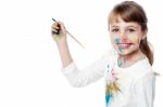 Little Girl With Painting Stock Photo