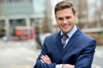 Smiling Businessman Posing For The Camera Stock Photo