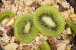 Healthy Muesli And Kiwi Background Stock Photo