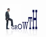 Man Stepping Towards Growth Stock Photo