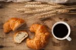 Tasty Croissant And Coffee Still Life Rustic Stock Photo