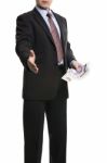 Some Unrecognizable Businessman In Dark Suit Shows A Spread Of 2 Stock Photo