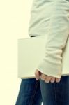 Young Girl With Book On White Background Stock Photo