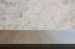 Top Of Wood Table On Old Concrete Wall Background Stock Photo