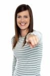 Woman Pointing Her Finger Towards The Camera Stock Photo