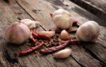 Herbs And Spices On Wooden Background Stock Photo