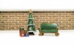 Empty Green Long Bench Near Christmas Tree And Gifts Stock Photo