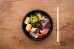 Japanese Food Tekka Don Take Away On Wooden Background Stock Photo