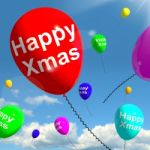 Balloons Floating With Happy Xmas Stock Photo