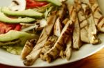 Chicken Fajitas On A White Plate Stock Photo