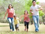 Family In The Park Stock Photo