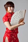 Chinese Model In Traditional Cheongsam Dress Stock Photo