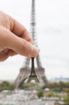 Hand Hold Eiffel Model Stock Photo