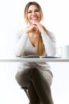 Young Beautiful Girl Reading News And Drinking Coffee. Isolated Stock Photo