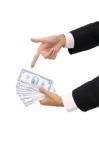 Point To Cash In Business Man On White Background Stock Photo