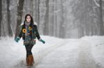 Beautiful Young Woman In A Sweater On A Winter Walk In A Park Stock Photo