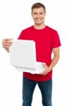 Smiling Male Holding Pizza Box Stock Photo