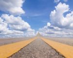 Road Asphalt To The Sky Over The Clouds Stock Photo