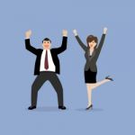 Business Man And Business Woman Celebrating Success Stock Photo