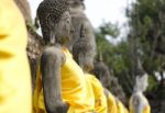 Ancient Buddha Statues At Wat Yai Chai Mongkol, Ayutthaya, Thail Stock Photo