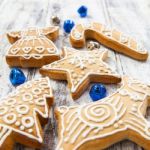 Christmas Gingerbread Cookies On White Table Stock Photo