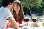 Attractive Couple On Romantic Picnic In Countryside Stock Photo