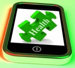 Health Smartphone Means Looking After Yourself And Wellbeing Stock Photo