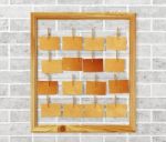 Picture Frame And Antique Note Papers On White Brick Wall Stock Photo