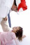 Father Wearing Christmas hat Stock Photo