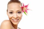 Cute Woman Face With Flower Stock Photo