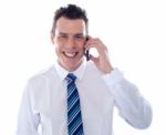 Businessman Talking Over Phone Stock Photo