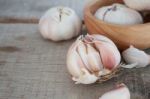 Garlic On Wooden Stock Photo