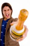 Front View Of Man Showing Champagne Bottle Stock Photo