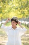 Portrait Of Young Beautiful Asian Woman Wearing Straw Hat With S Stock Photo