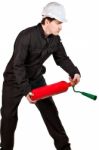 Handyman Wearing Uniform And Hardhat Stock Photo