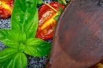 Baked Cherry Tomatoes With Basil And Thyme Stock Photo