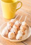 Squid Grilled Ball On Wooden Plate Stock Photo